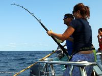 Susana bringing in yet another Yellowfin Tuna. She took to it like a champ and natural!!!